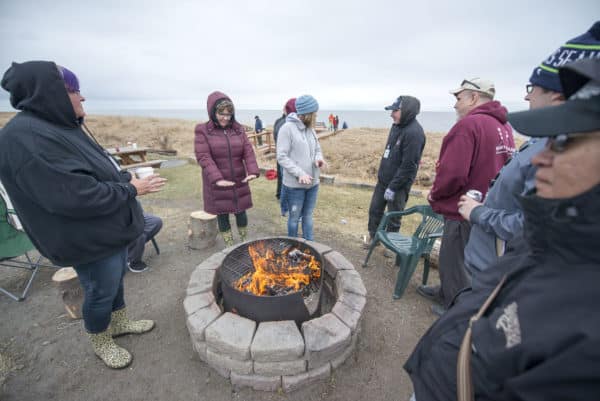 The fire was a popular stop during the opening of the net on May 1. The day featured a brisk breeze and intermittent rain.