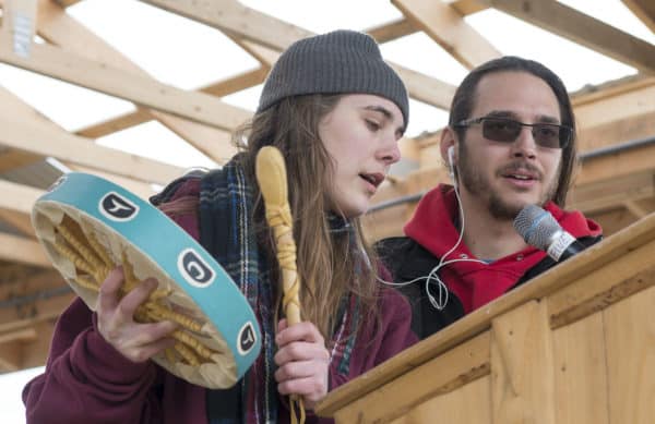 Jasmine Koster and Joel Isaak perform "Dena'ina Qenaga" during opening ceremonies for the net on May 1.