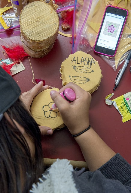 Breezy Big Crow creating drum ornament