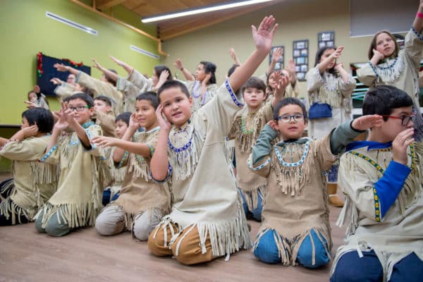 The Jabila’ina Dance Group and Del Dumi Intertribal Drum Group perform at the Tribe's Tyotkas Elder Center.
