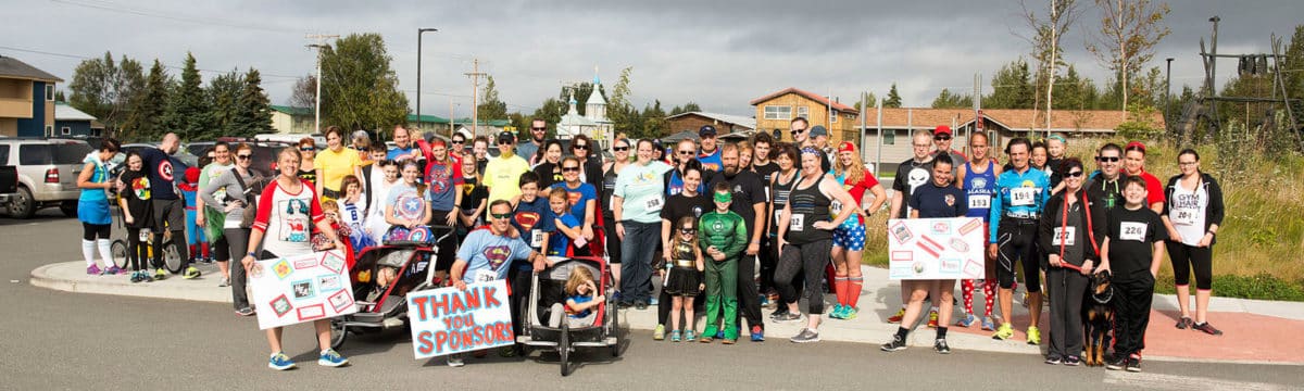 Participants in CASA superhero race