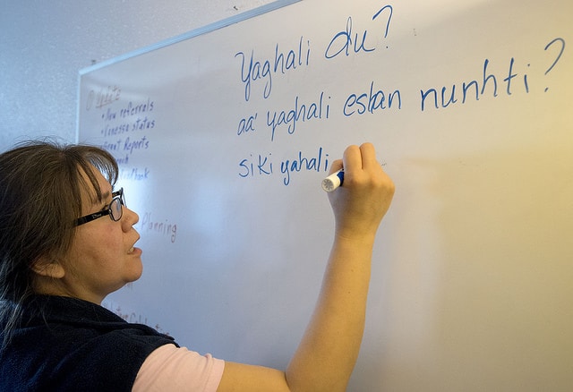 Sondra Stuart writing Dena'ina greeting