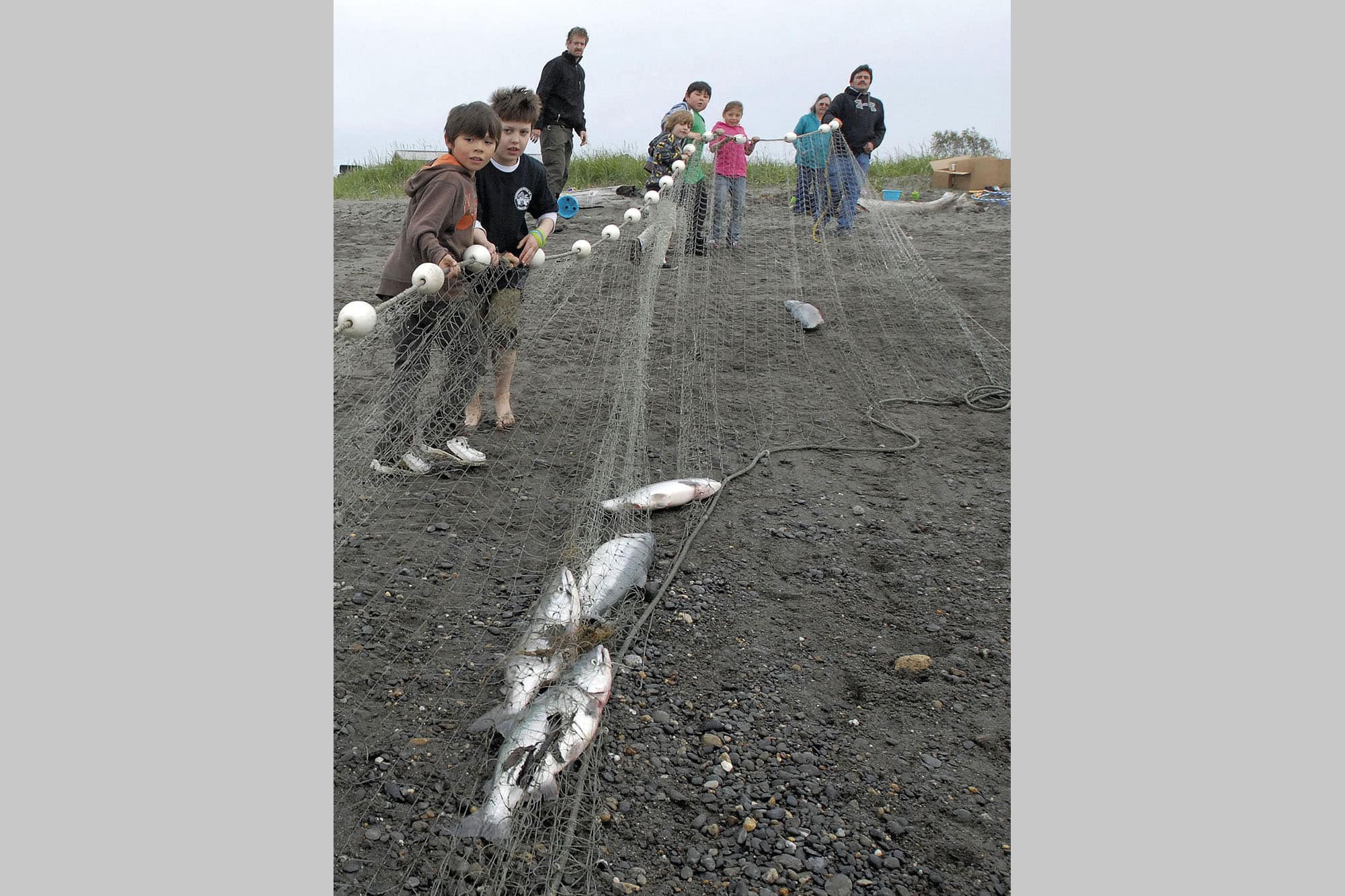 Children work to pull the tribe’s net from Cook Inlet.