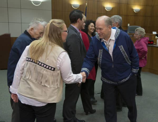 Executive Council Chairperson Jennifer Showalter Yeoman shakes Gov. Bill Walker's hand following the ceremony.