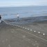 Julianne Wilson and George Showalter set the tribal net into Cook Inlet.