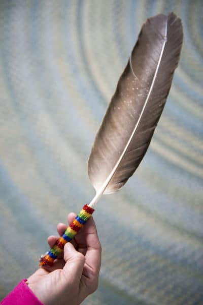 In the Ts’ilq’u Circle, participants may speak when they are holding the designated talking piece. Some choose the eagle feather, others choose a different item.